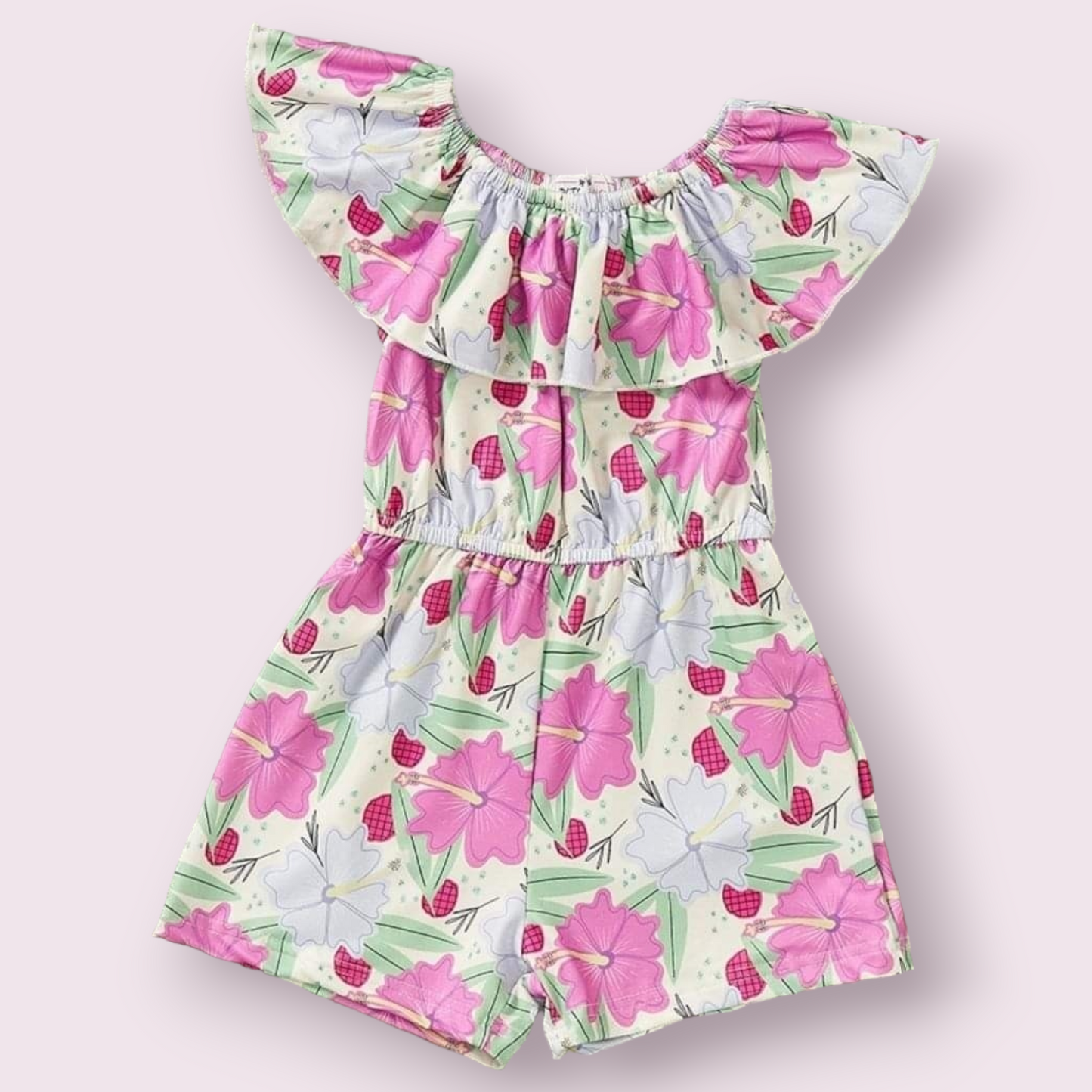Hibiscus jumpsuit with pink floral pattern and ruffled neckline.