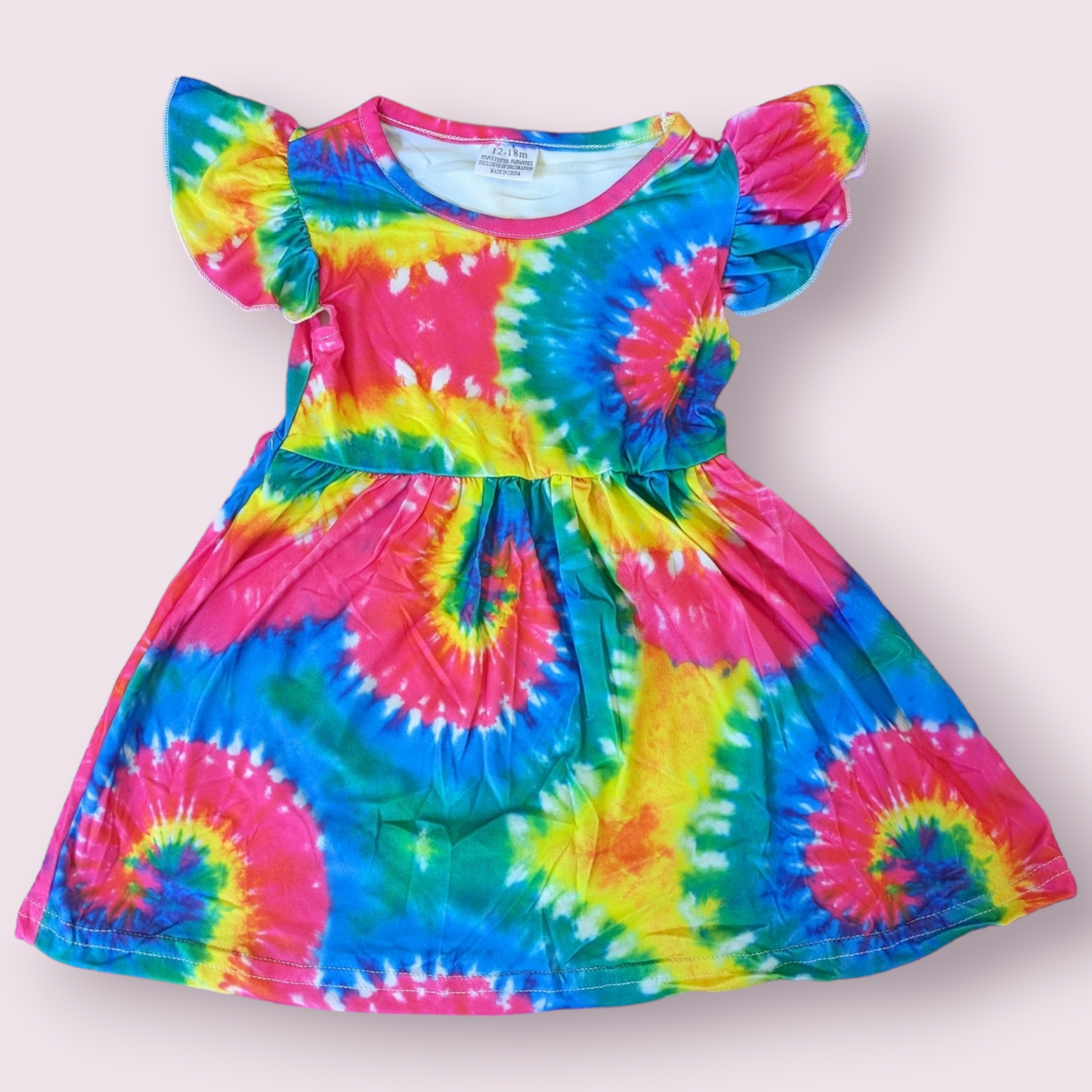 Rainbow Tie Dye Dress in vibrant colors with short sleeves.