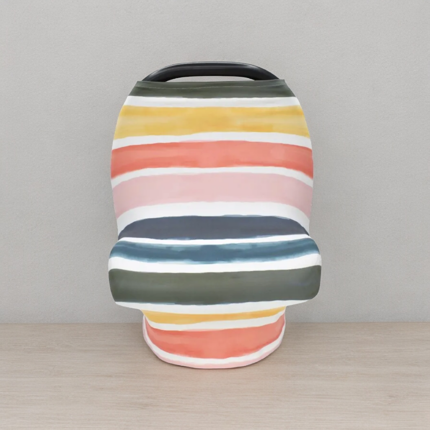 Vibrant striped multi-use cover for nursing, car seat, and shopping cart.