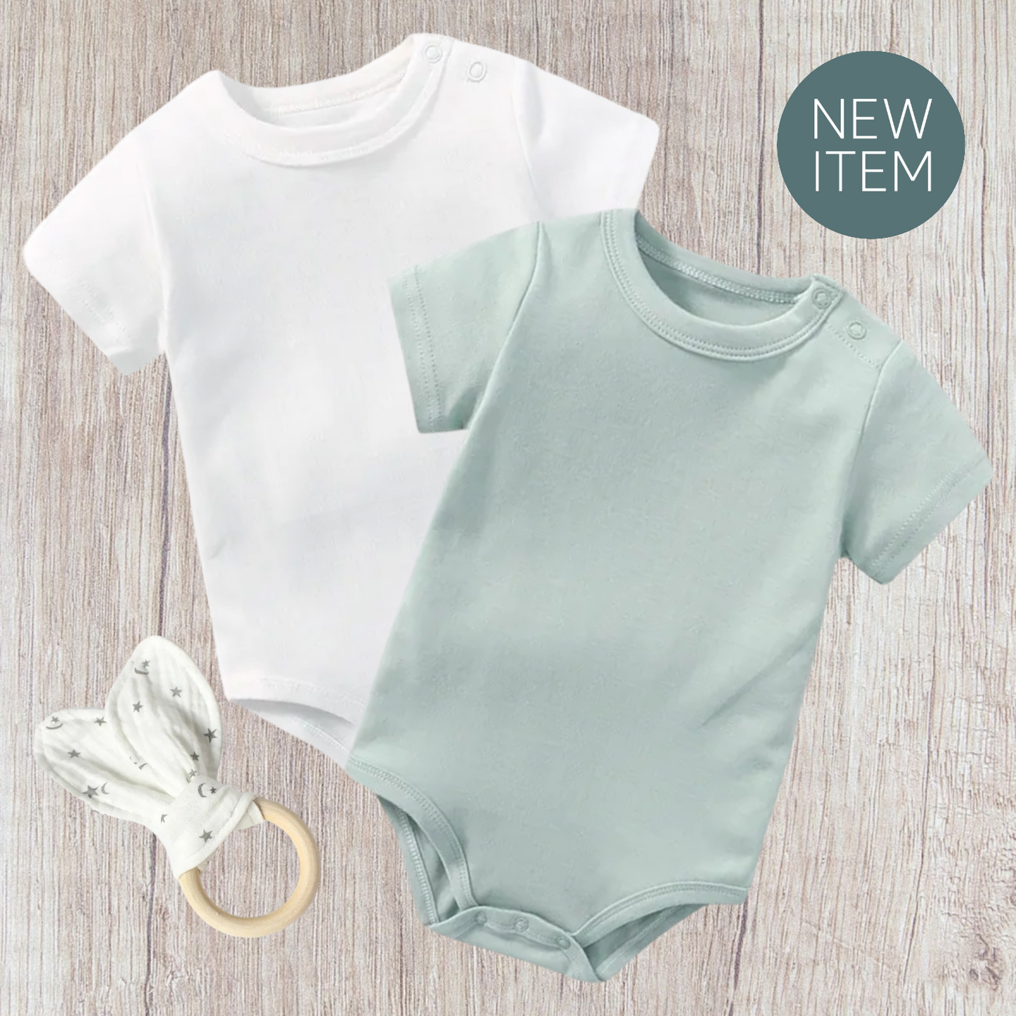 Baby bodysuit set in green and white with rabbit ear teether, soft cotton fabric.