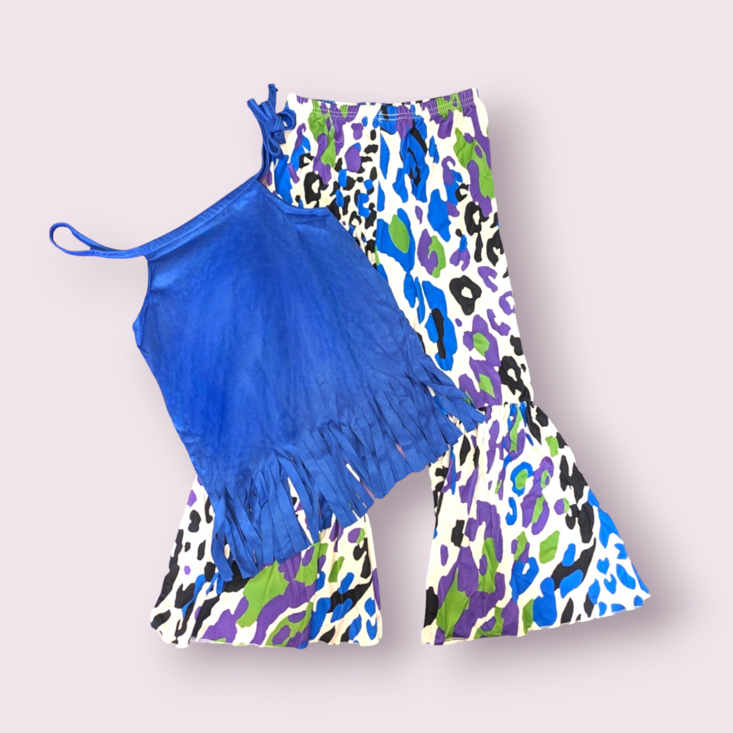 Vibrant Safari Outfit with blue fringe tank top and colorful leopard print bell-bottom pants.