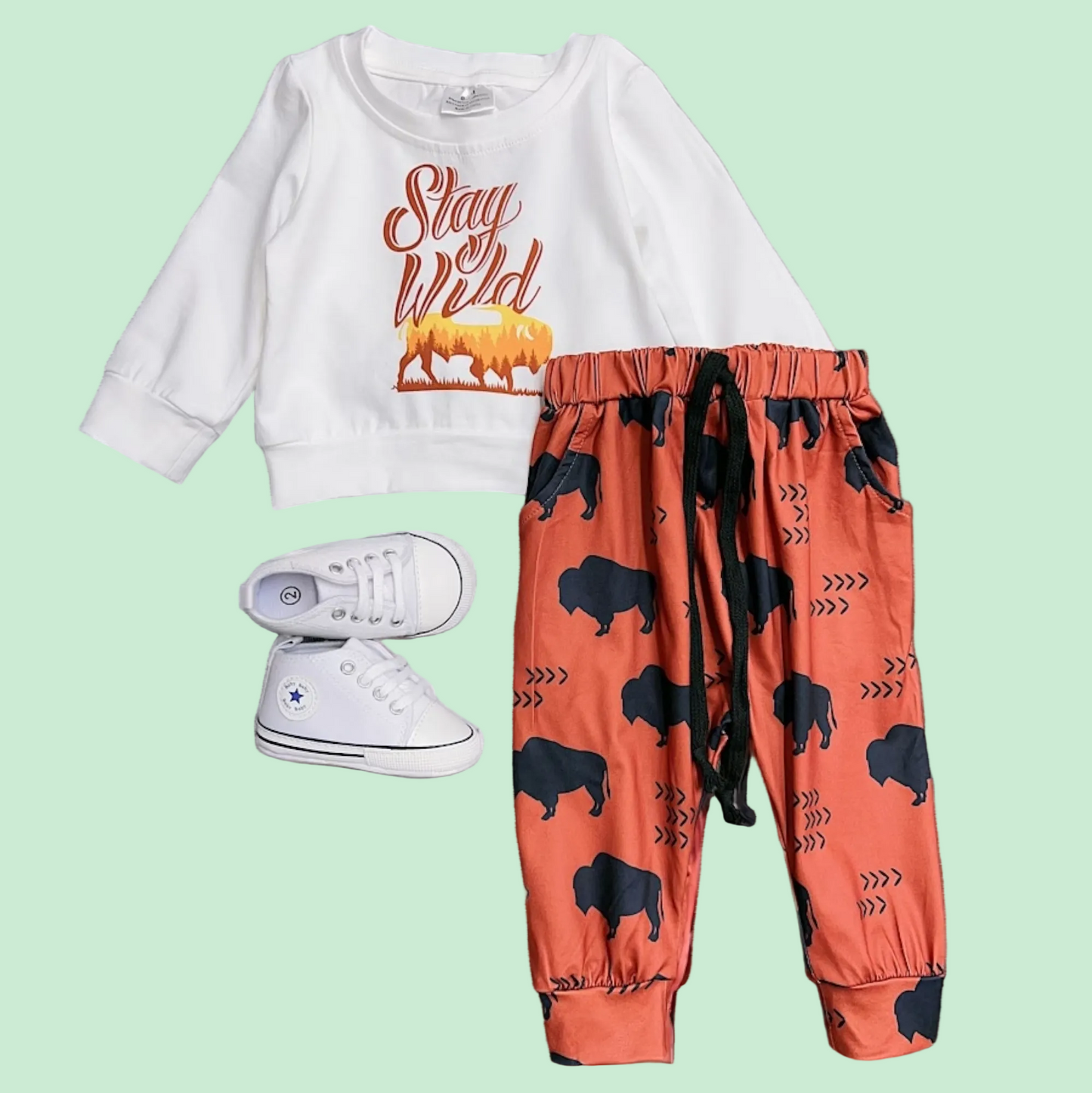 Boy's "Stay Wild" 2-piece set with long-sleeved shirt and printed joggers, shoes not included.