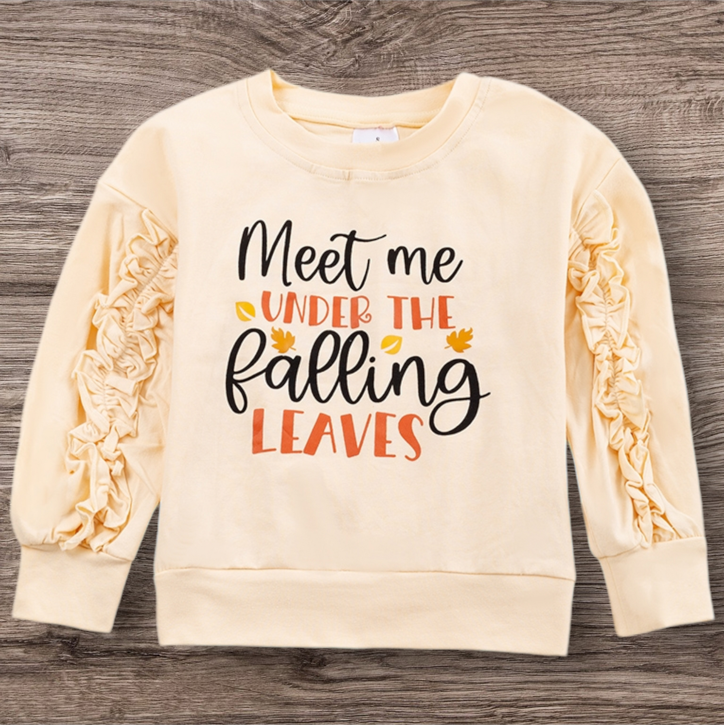 Meet Me Under The Falling Leaves Sweatshirt with ruffle sleeves, perfect for fall.