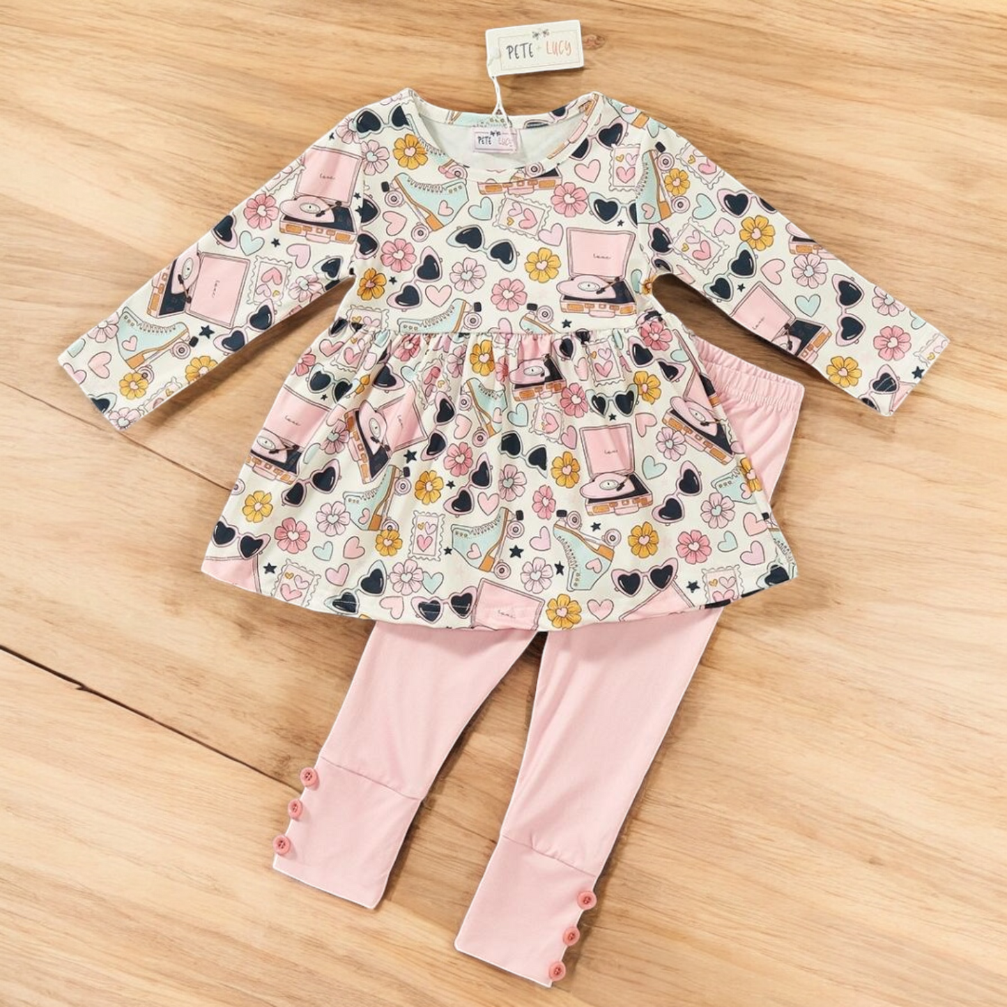 Adorable Retro Lovin' 2 Piece Pant Set featuring a heart and flowers print tunic with pink pants.