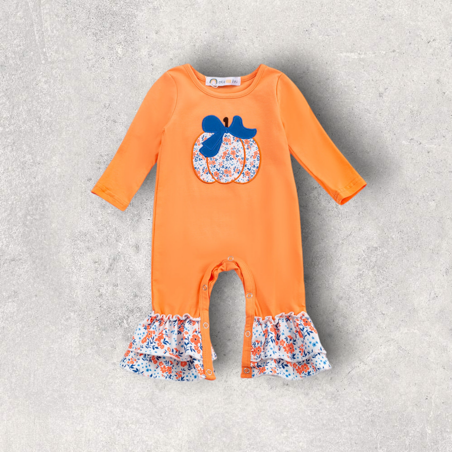 Orange baby romper with floral pumpkin applique and ruffled legs, Garden Gourds Romper.