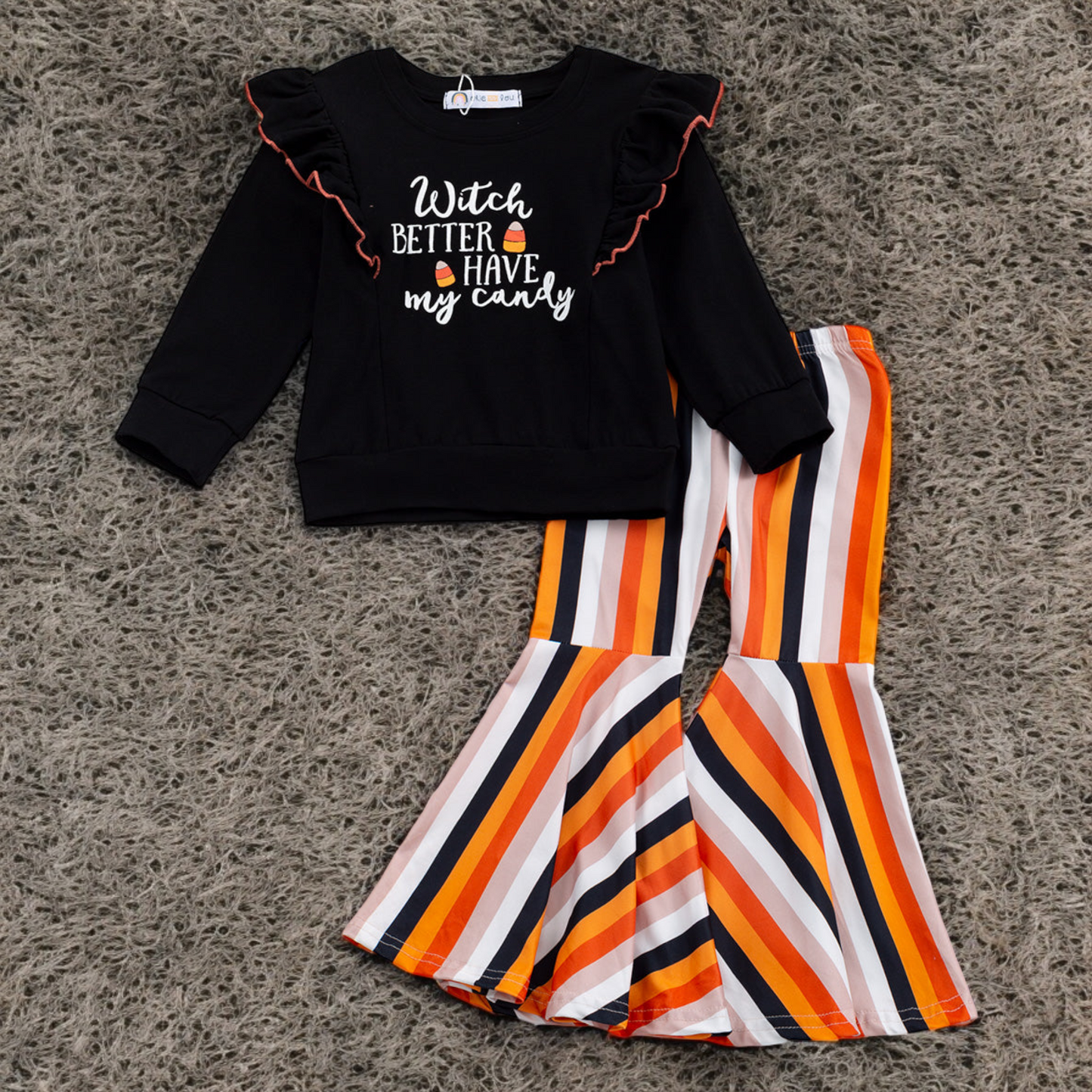 Toddler Halloween outfit with black "Witch Better Have My Candy" top and colorful striped bell bottom pants