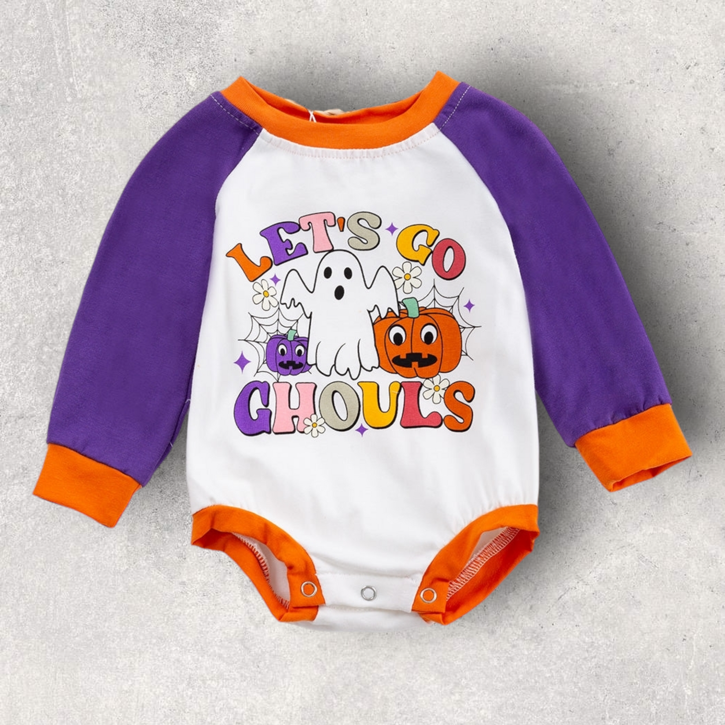 Let's Go Ghouls romper with ghost and pumpkin design, purple sleeves, and orange trim for Halloween baby costume