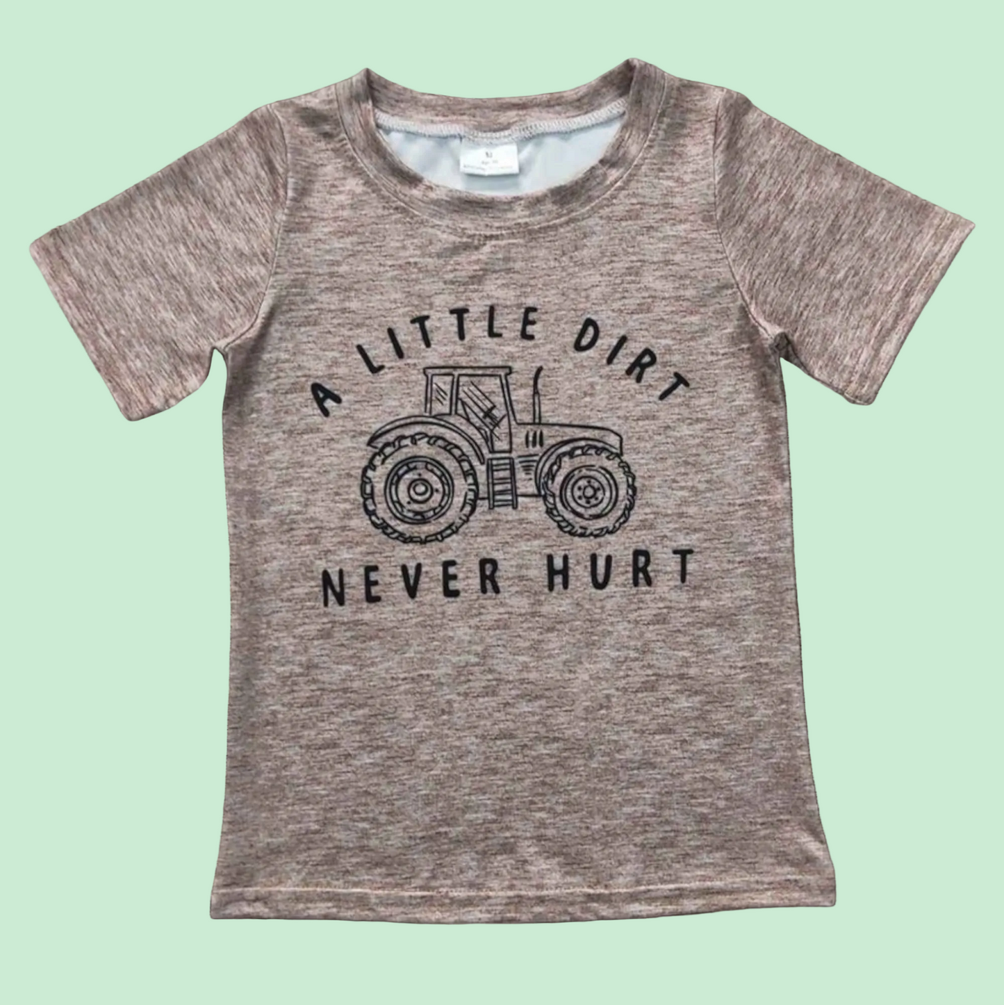 Brown Tractor Top featuring a tractor graphic and "A Little Dirt Never Hurt" text, made from 95% cotton and 5% spandex.