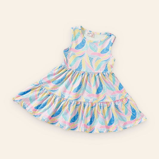 Beach Vibes Dress with colorful pattern, jewel neckline, and sleeveless A-line design.