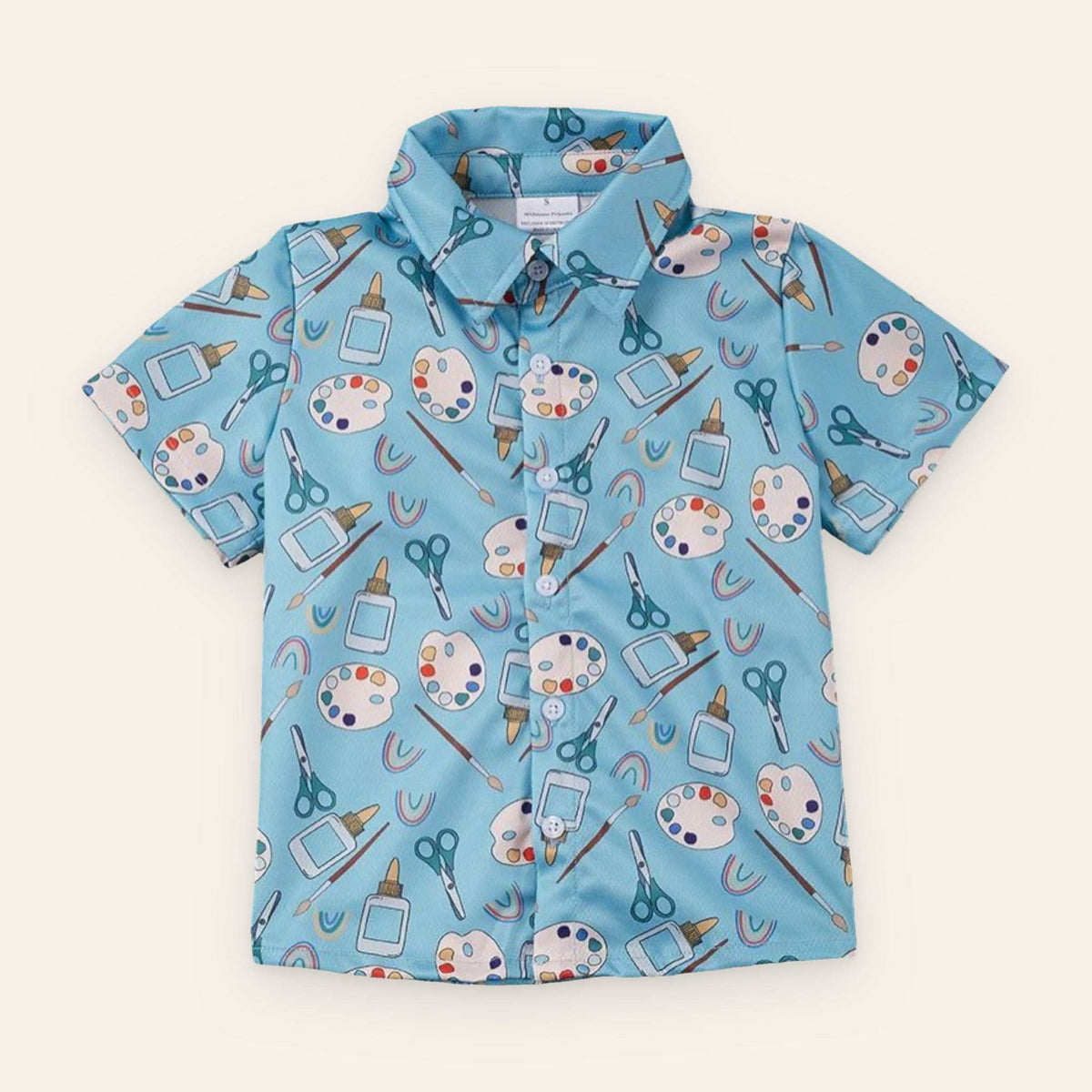 Boys button-up shirt with art supplies pattern in blue, made of polyester and spandex.