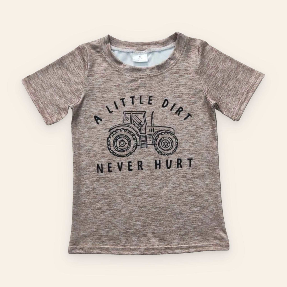 Brown Tractor Top featuring a tractor graphic and "A Little Dirt Never Hurt" text, made from 95% cotton and 5% spandex.