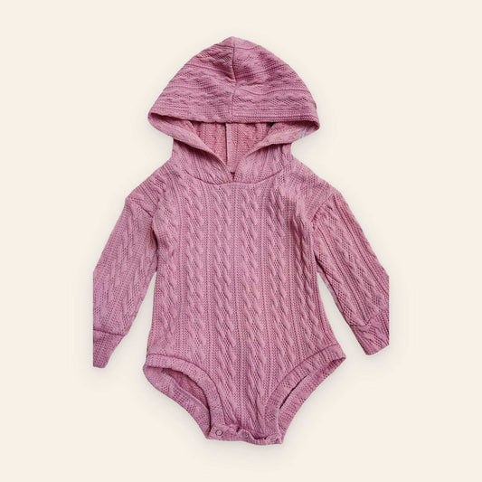 Pink cable knit baby one piece with hoodie made of polyester and spandex