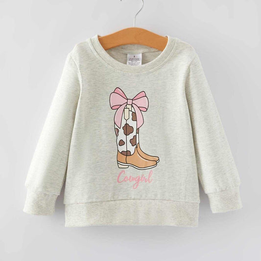 Cowgirl sweatshirt with playful cow boot design, cotton-spandex blend.