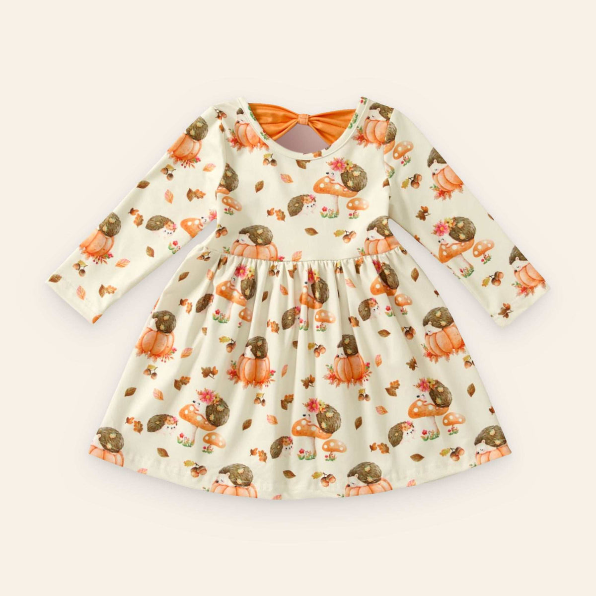 Girls' Hedgehog Hollow Dress with long sleeves and autumn-themed hedgehog and pumpkin print, made from soft polyester-spandex blend
