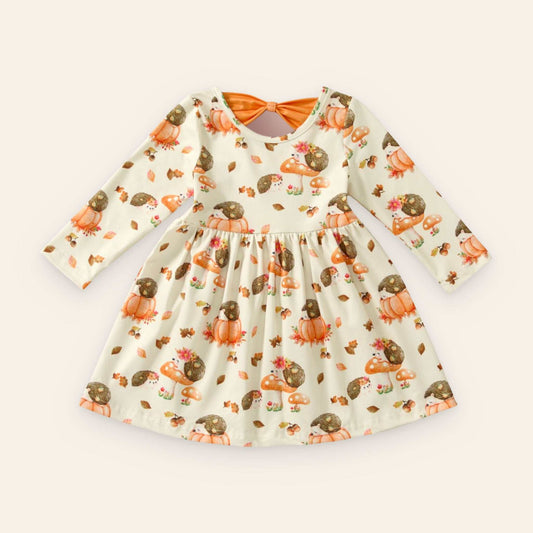 Girls' Hedgehog Hollow Dress with long sleeves and autumn-themed hedgehog and pumpkin print, made from soft polyester-spandex blend