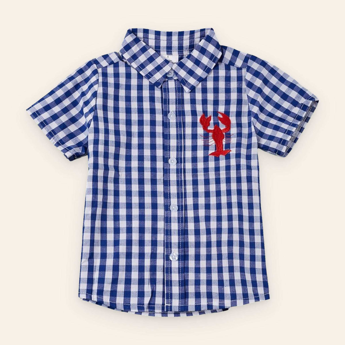 Navy blue gingham button up shirt for kids with red lobster embroidery.