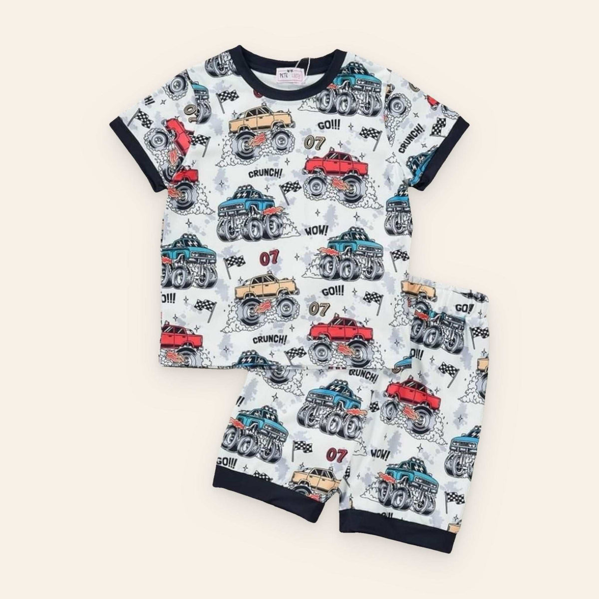 Mud Mayhem Loungewear Set with monster truck print, featuring a crew neckline and short sleeves, garterized waist shorties, made from P-Lush fabric.