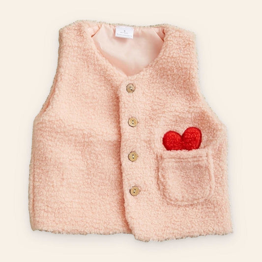 Pink Sherpa Vest for toddlers with button closure and heart detail on pocket