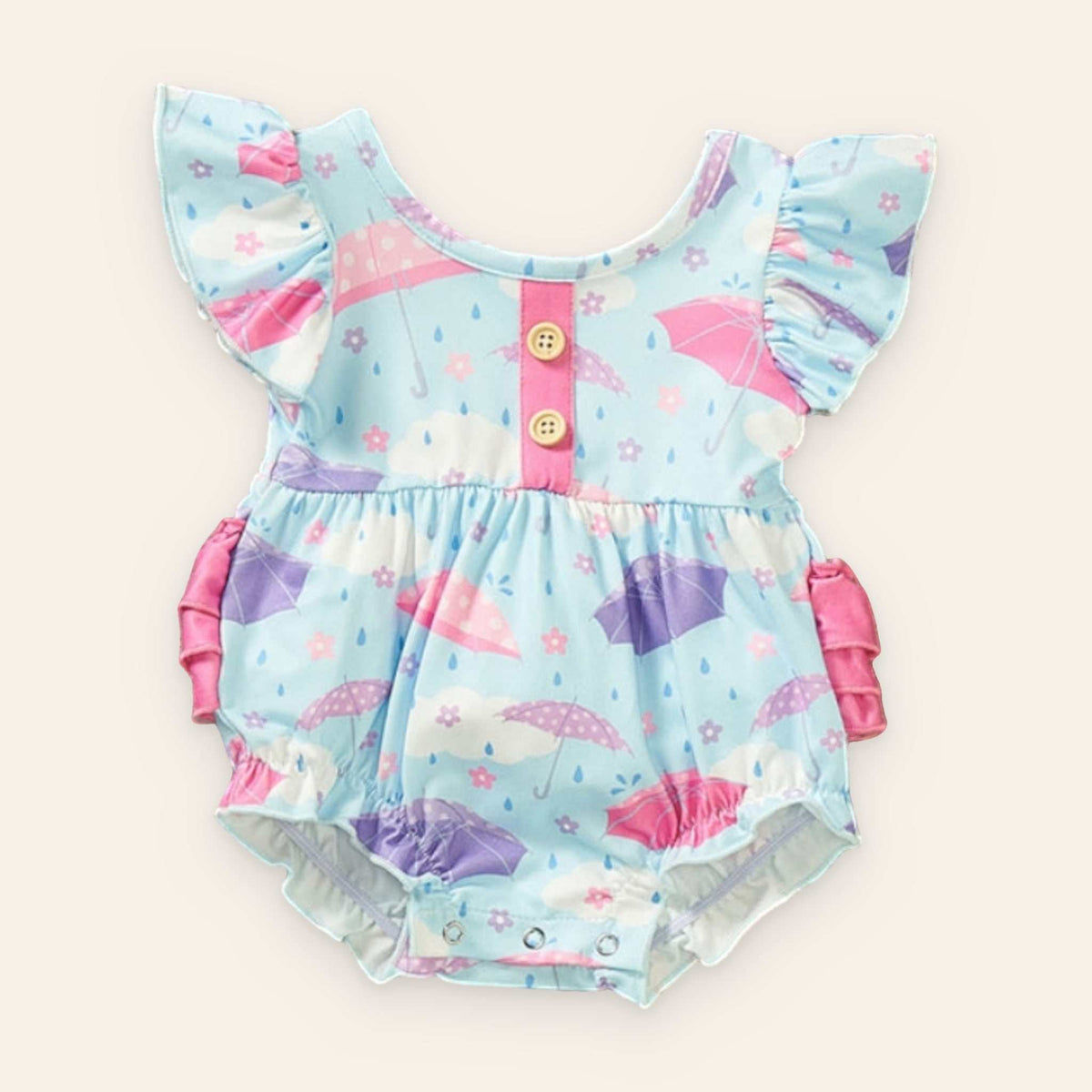 Cute Rainy Days Romper with umbrella print and ruffled sleeves.