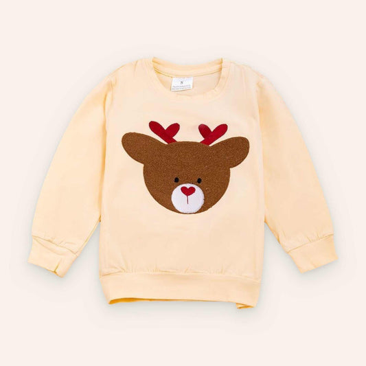 Cream-colored reindeer sweatshirt with red antlers and heart-shaped nose design made of cotton and spandex
