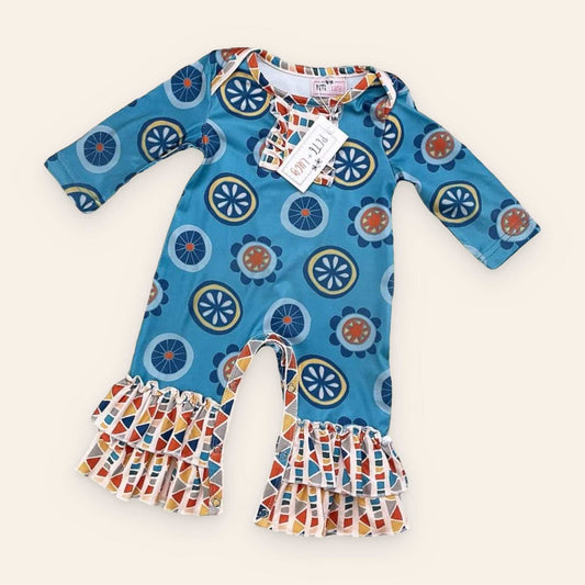 Retro Geo Girl Romper with jewel neckline, long sleeves, and ruffle hem detailing.