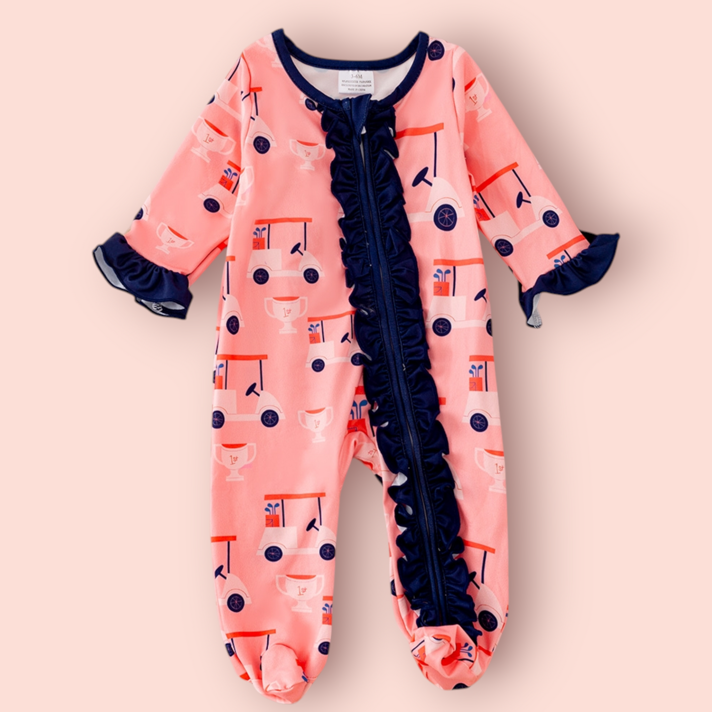 Pink golf romper for babies with zipper and ruffle trim, made of polyester and spandex blend