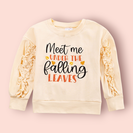 Cream-colored children's sweatshirt with ruffle sleeves and "Meet Me Under The Falling Leaves" text design
