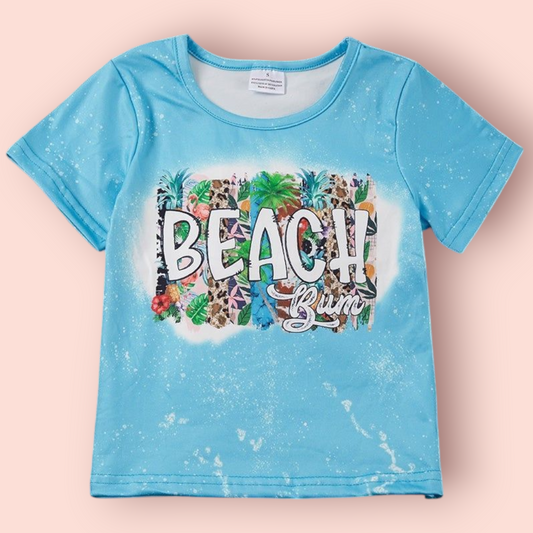Light blue Beach Bum T-shirt with tropical print and speckled design, made of 95% polyester and 5% spandex.