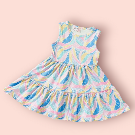 Beach Vibes Dress with colorful pattern, jewel neckline, and sleeveless A-line design.