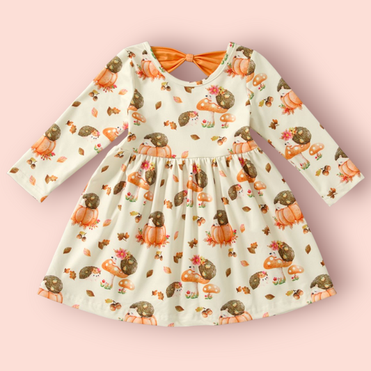 Girls' Hedgehog Hollow Dress with long sleeves and autumn-themed hedgehog and pumpkin print, made from soft polyester-spandex blend