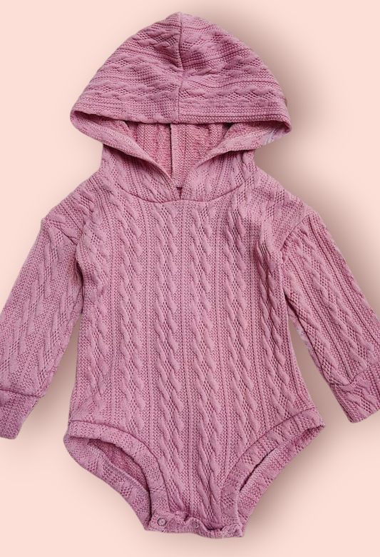 Pink cable knit baby one piece with hoodie made of polyester and spandex