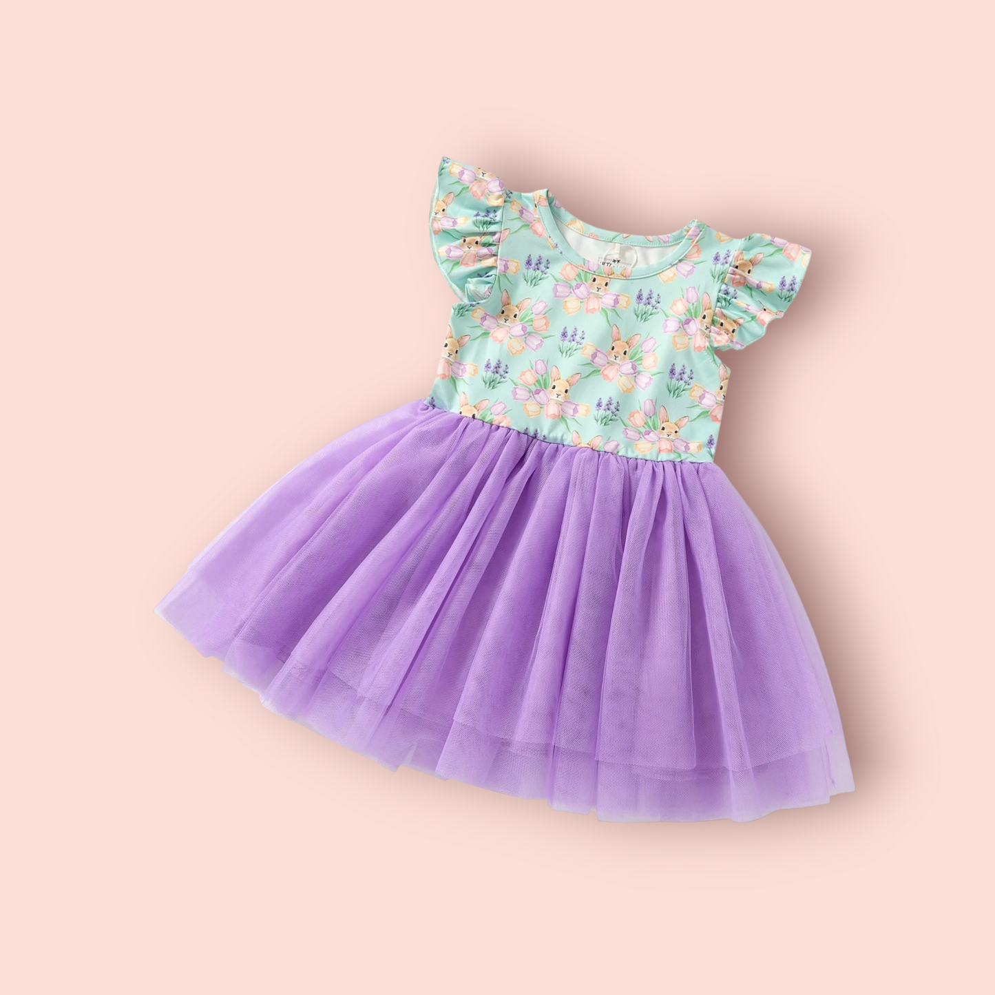 Child wearing Bunny Bouquet Tulle Dress with floral and bunny design, perfect for Easter and spring photos.