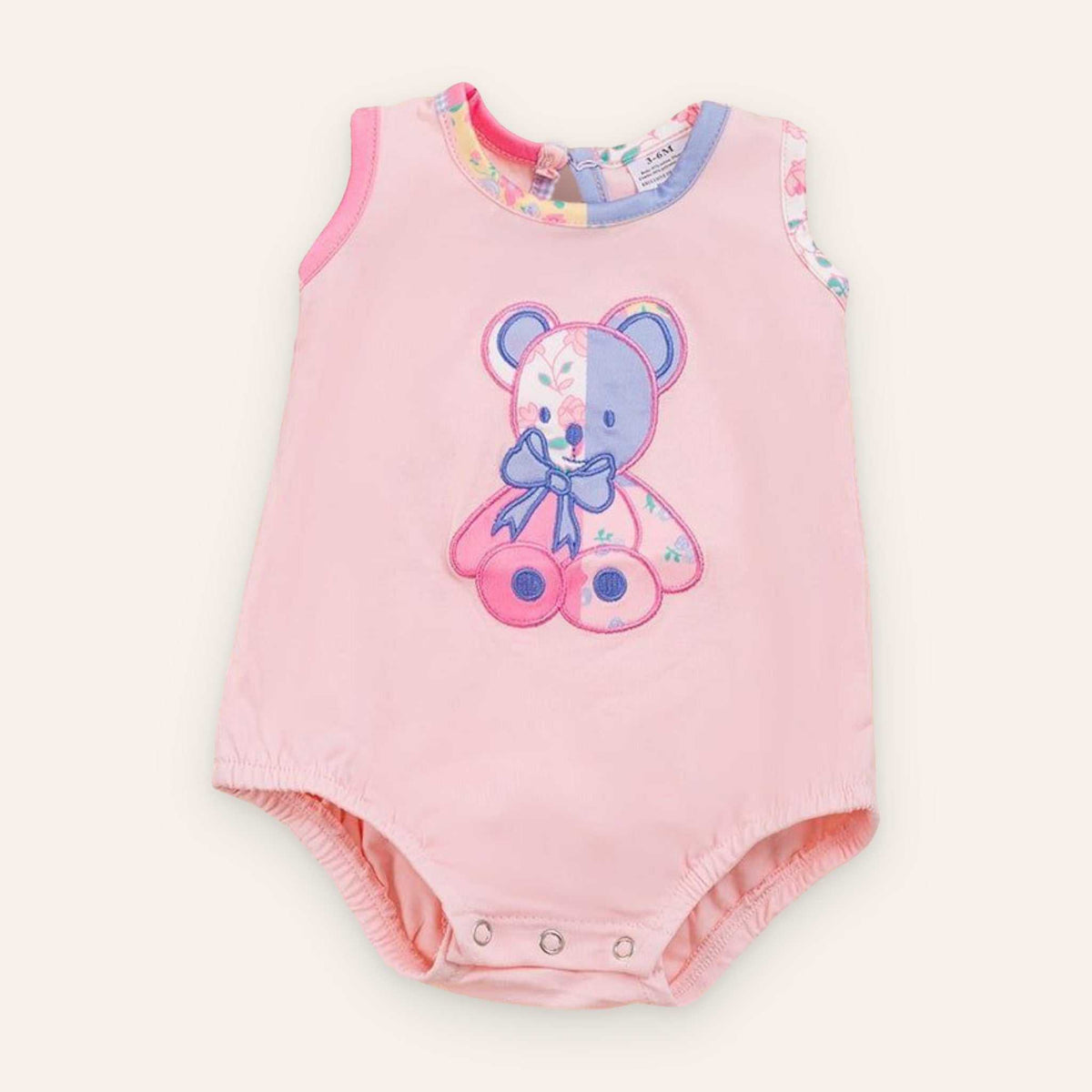 Teddie Bear One Piece baby onesie with teddy bear applique, soft cotton blend.