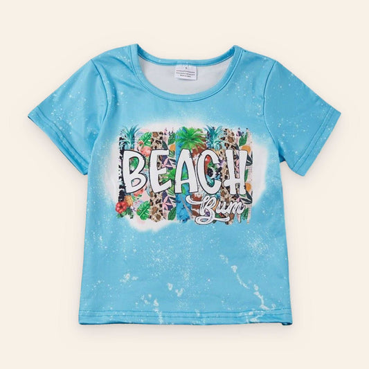 Light blue Beach Bum T-shirt with tropical print and speckled design, made of 95% polyester and 5% spandex.