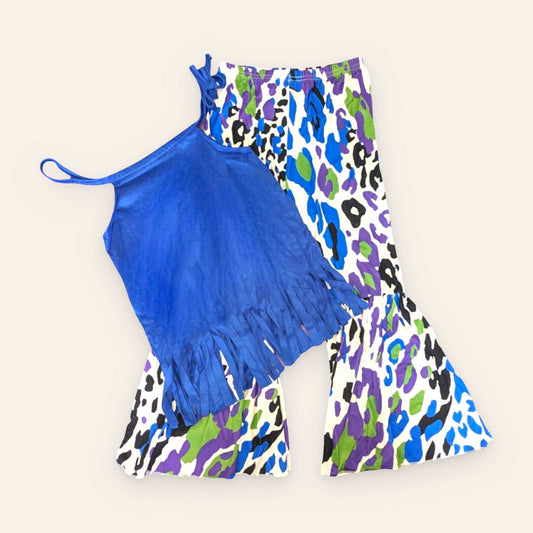 Vibrant Safari Outfit with blue fringe tank top and colorful leopard print bell-bottom pants.